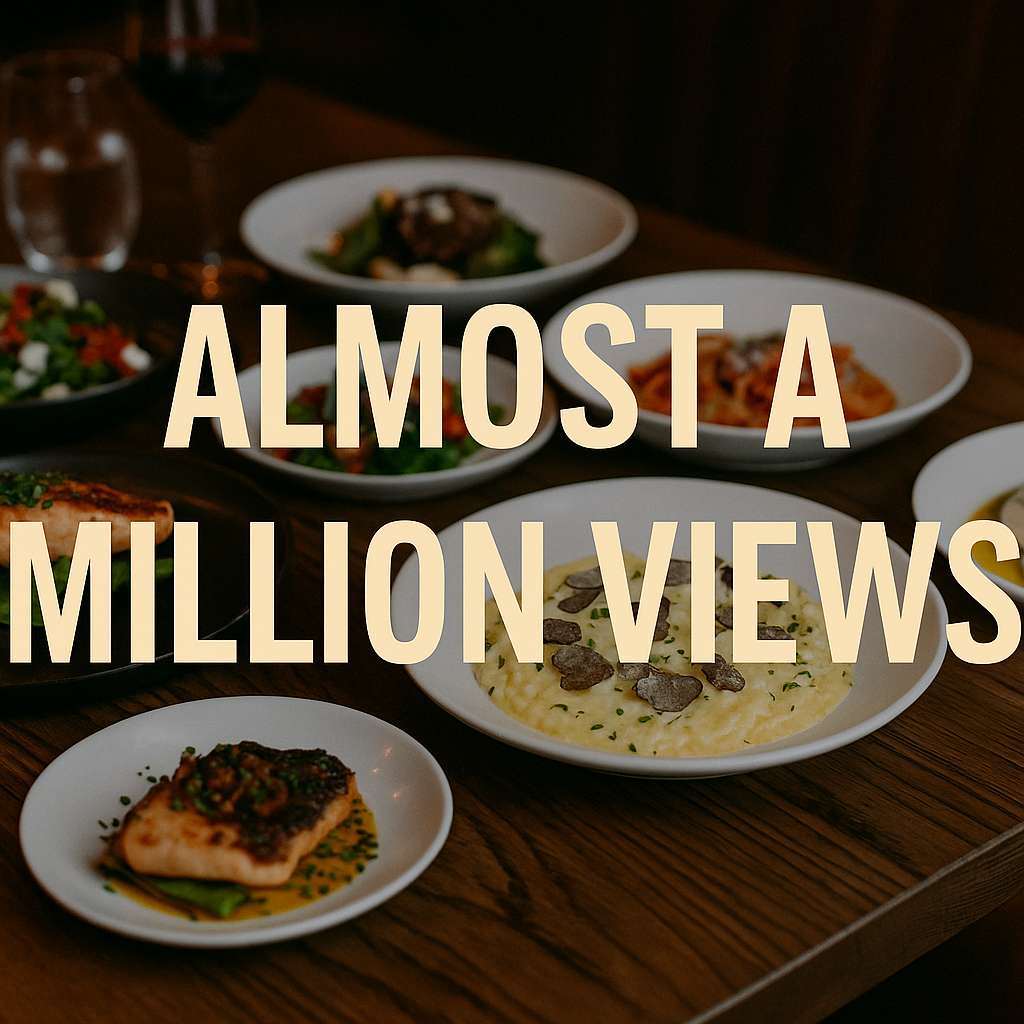 Image with a table of gourmet food + overlay reading “Half a Million Views Later…”